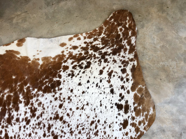 WHITE & BROWN DAPPLE COWHIDE RUG