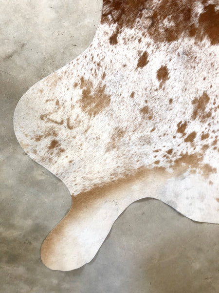 WHITE & BROWN DAPPLE COWHIDE RUG